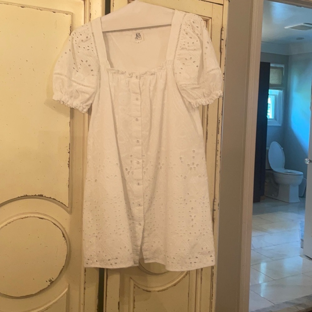 White mini dress. Eyelet . Beautiful for summer .